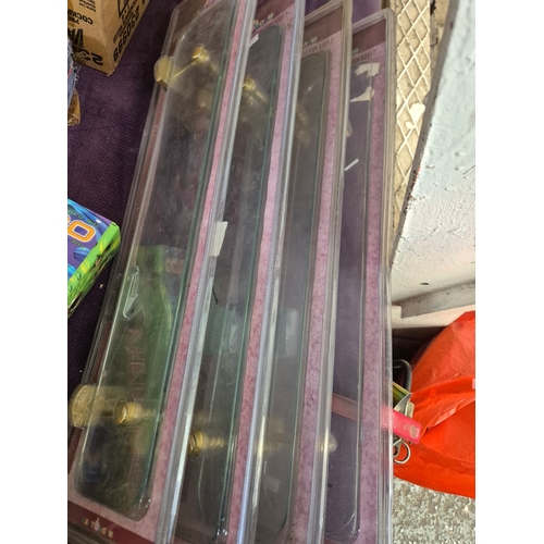 166 - 4 brand new glass shelves with brass coloured brackets