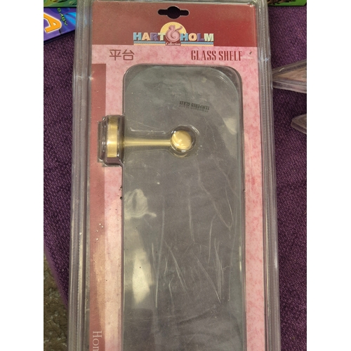 166 - 4 brand new glass shelves with brass coloured brackets