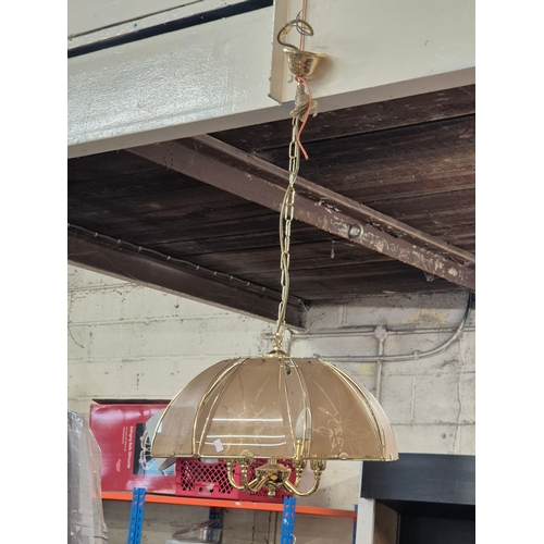 188 - Vintage chandelier featuring a polished brass frame with smoky glass