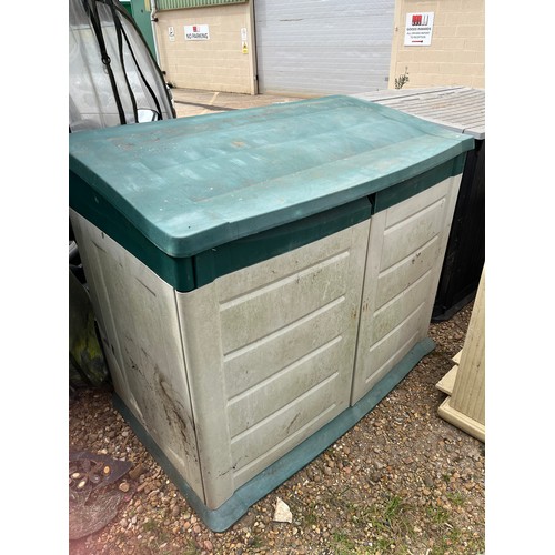 434 - Out door storage shed in green and cream