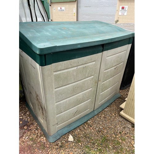 434 - Out door storage shed in green and cream