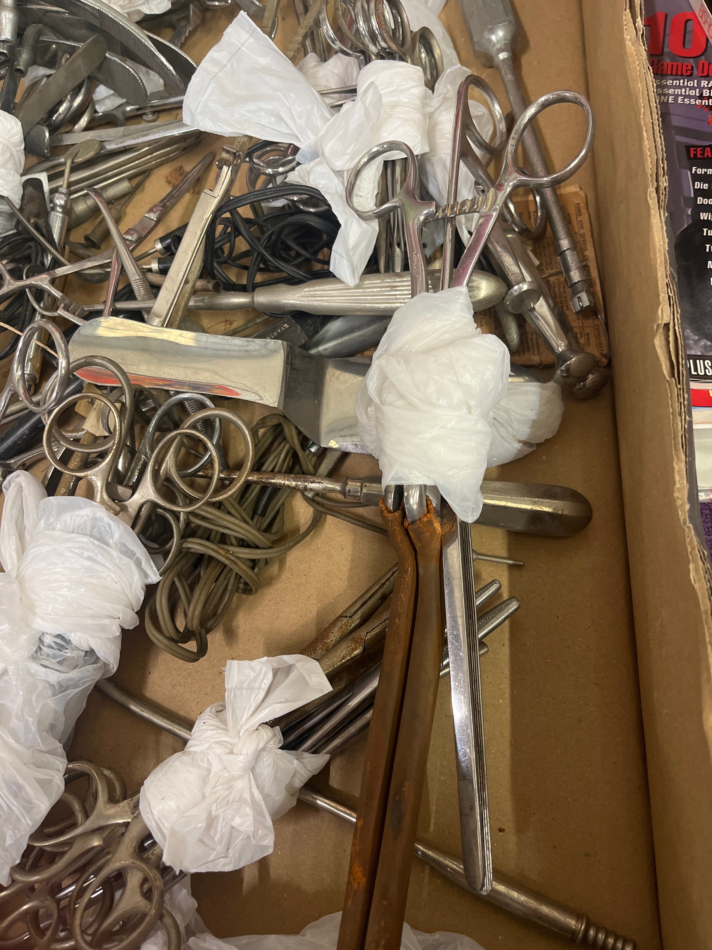 2 boxes containing various antique or vintage medical or surgical ...