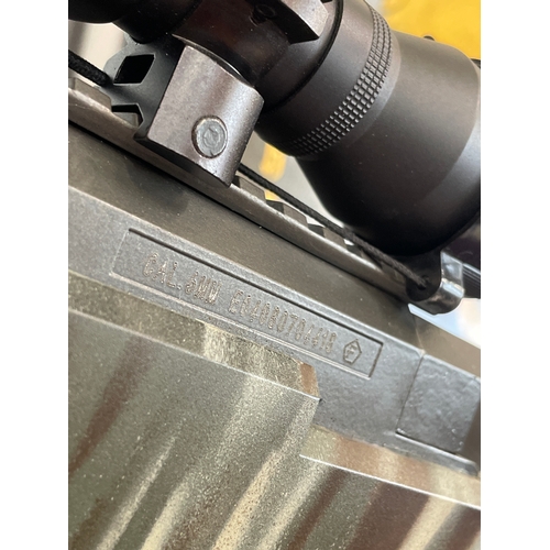 Rifle. Airsoft springer with camouflage custom paint finish. With soft ...