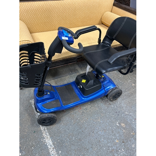 Komfi Rider mobility scooter with key & instruction book - believed to ...