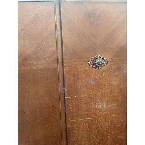 317 - Art Deco style burr walnut piece, likely dating from the 1920s or 1930s. With key