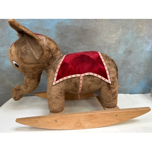 330 - Vintage circus elephant ride on toy 80cm x 55cm. Back right leg needs repair. Teddy bear for scale.