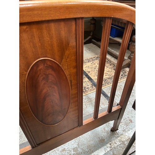 331 - Edwardian mahogany single bed, with cast iron  rails, casters and the original sprung horse hair bas... 