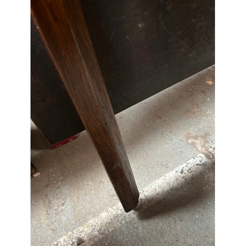 340 - Georgian solid oak drop leaf dining table. On later castors
