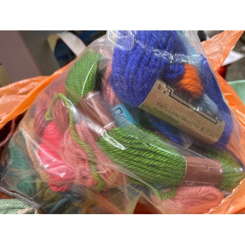 362 - Quantity of crafting -cross stitch magazines & also tapestry wool & knitting wool.