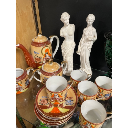 377 - Interesting shelf full of decorative items. Wedgwood Jasperware, Chinese teaset, Limoges plates & tr... 