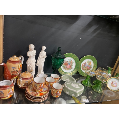 377 - Interesting shelf full of decorative items. Wedgwood Jasperware, Chinese teaset, Limoges plates & tr... 