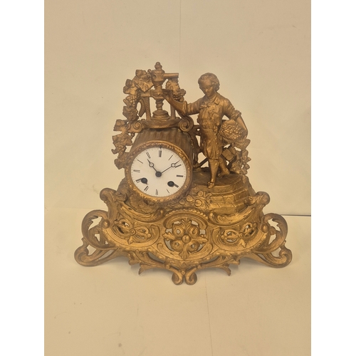 162 - French gilt metal or ormolu mantel clock featuring a figural surmount of a child with grapes, needs ... 