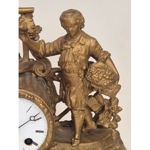 162 - French gilt metal or ormolu mantel clock featuring a figural surmount of a child with grapes, needs ... 