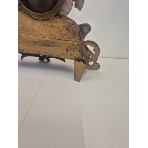 162 - French gilt metal or ormolu mantel clock featuring a figural surmount of a child with grapes, needs ... 