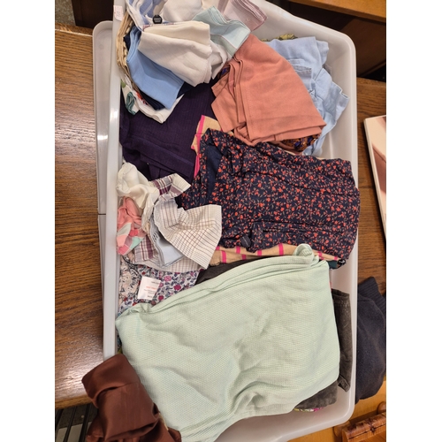 410 - Large lidded box of mixed clothing and scarves