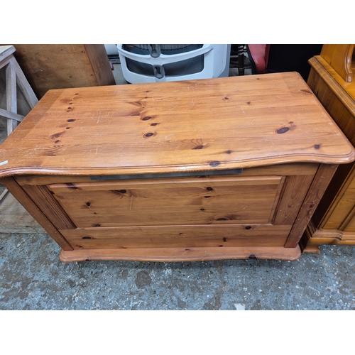 420 - Pine storage ottoman with fitted interior shelf, lift up lid and drop down front