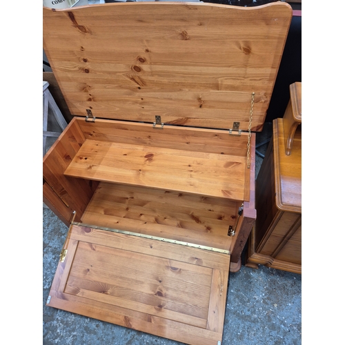 420 - Pine storage ottoman with fitted interior shelf, lift up lid and drop down front