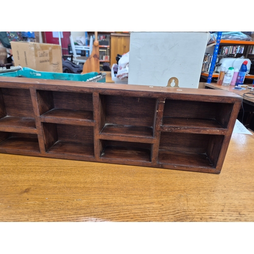 439 - Dark brown wooden sectional shelf