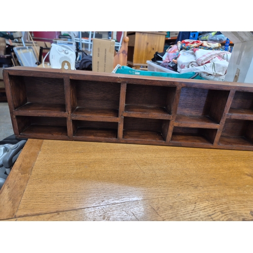 439 - Dark brown wooden sectional shelf