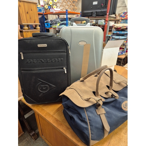 442 - Calvin Hill hard shell case, small Dunlop case and a Cotton Traders holdall