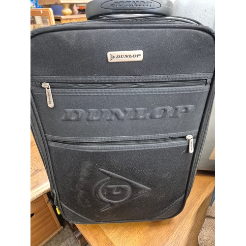 442 - Calvin Hill hard shell case, small Dunlop case and a Cotton Traders holdall