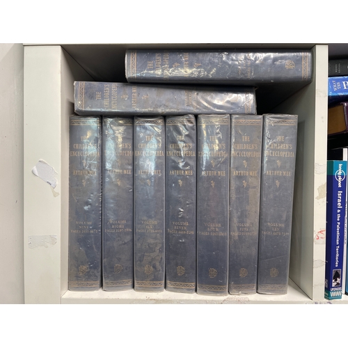 205 - 11 x cubes containing a huge quantity of mixed books.