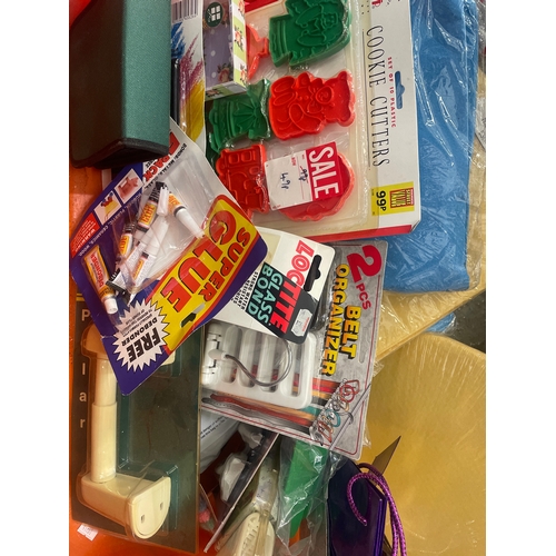 256 - Useful lot ( mostly new/packaged)includes beach mat/bag, multi-purpose cloths, superglue, cookie cut... 