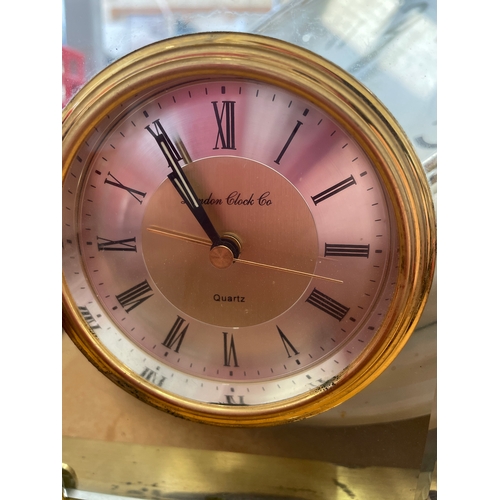 293 - 2 x London Clocks. Brass Mantle & a wall.