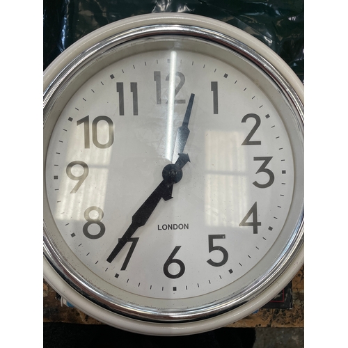 293 - 2 x London Clocks. Brass Mantle & a wall.