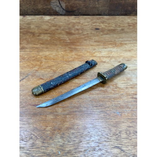 66 - Antique Japanese scale miniature samurai sword/katana with scabbard. Approx 7&rdquo; long.
