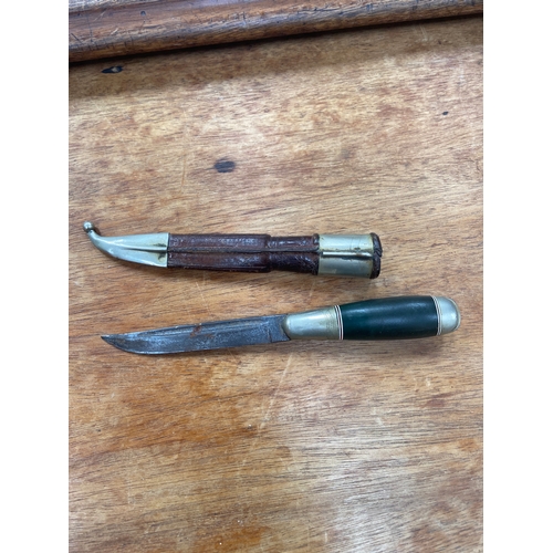 65 - Traditional Finnish Puukko, a style of general-purpose utility and hunting knife with bulbous ebonit... 