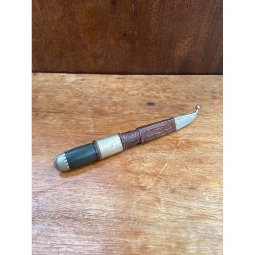 65 - Traditional Finnish Puukko, a style of general-purpose utility and hunting knife with bulbous ebonit... 