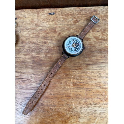 62 - WWII U.S military Wittnauer pocket compass,featuring a hunter-style nickel-plated case with a push-b... 