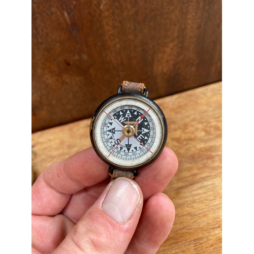 62 - WWII U.S military Wittnauer pocket compass,featuring a hunter-style nickel-plated case with a push-b... 