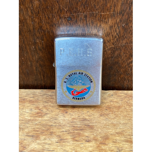 61 - Vintage Zippo cigarette lighter featuring a printed 