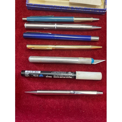 13 - Collection of 4 pens and a scalpel -paper mate, pencil and Yard-0-led&rsquo; box