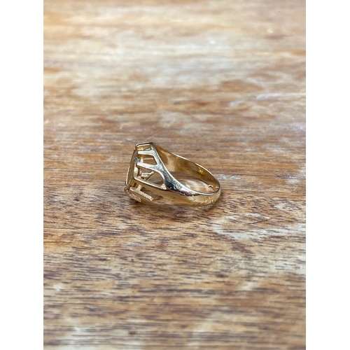 31 - Queen Victoria 22ct 1/8 sovereign, set in an open patterned work 18ct gold ring. Total weight 4.54g.... 