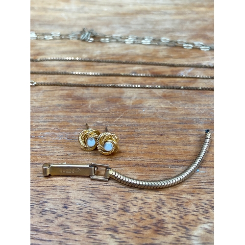 32 - 9.44g of scrap 9ct gold, including a couple of necklaces, Dennison watch back, section of fob chain ... 