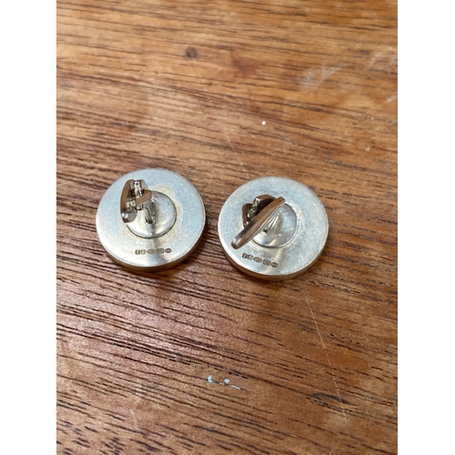 34 - Pair of sterling silver St. George cufflinks. 10.03g total weight.