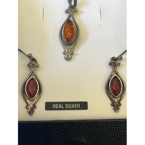 1 - Sterling Silver Baltic Amber pendant &nbsp;and matching earrings. Boxed