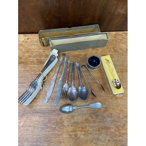 44 - Collection of silver plated flatware, including box of 6 unused forks, teaspoons, knives, sugar nips... 