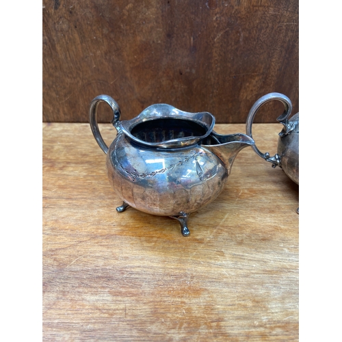 47 - Fine silver-plated sugar bowl and cream jug set, produced by Viners of Sheffield with fluted, melon-... 