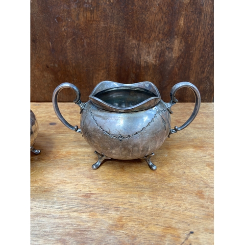 47 - Fine silver-plated sugar bowl and cream jug set, produced by Viners of Sheffield with fluted, melon-... 
