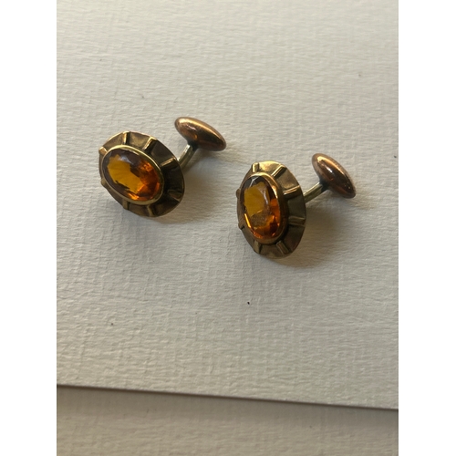 31 - Late 19th Century citrine glass cufflinks in gilded mount. Quality workmanship&nbsp;