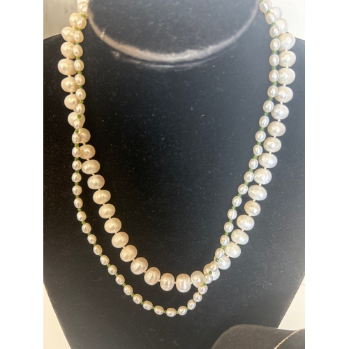 40 - Three beautiful cultured pearl necklaces to include one with a heavy 9ct gold clasp.&nbsp;