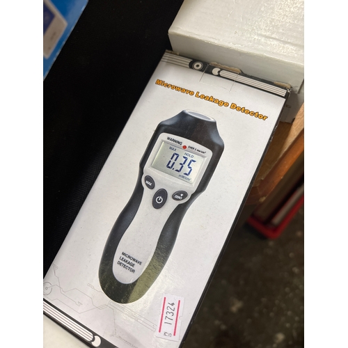 Gadgets. Laser distance Meter, Car phone charger, Microwave leakage ...