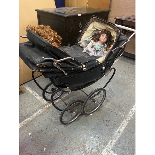Vintage coach-built twin dolls pram, featuring two porcelain collector ...