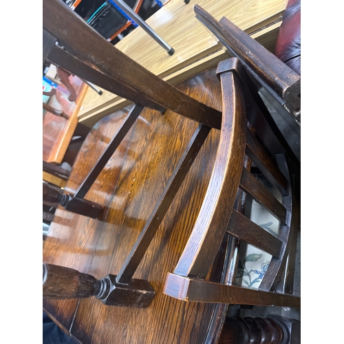 Vintage oak wind out single leaf dining table with four chairs and key