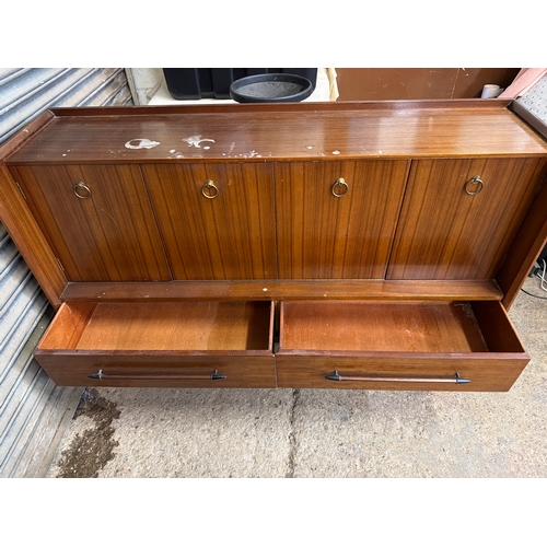 Mid-century “LINK” sideboard featuring drop-front desk section.