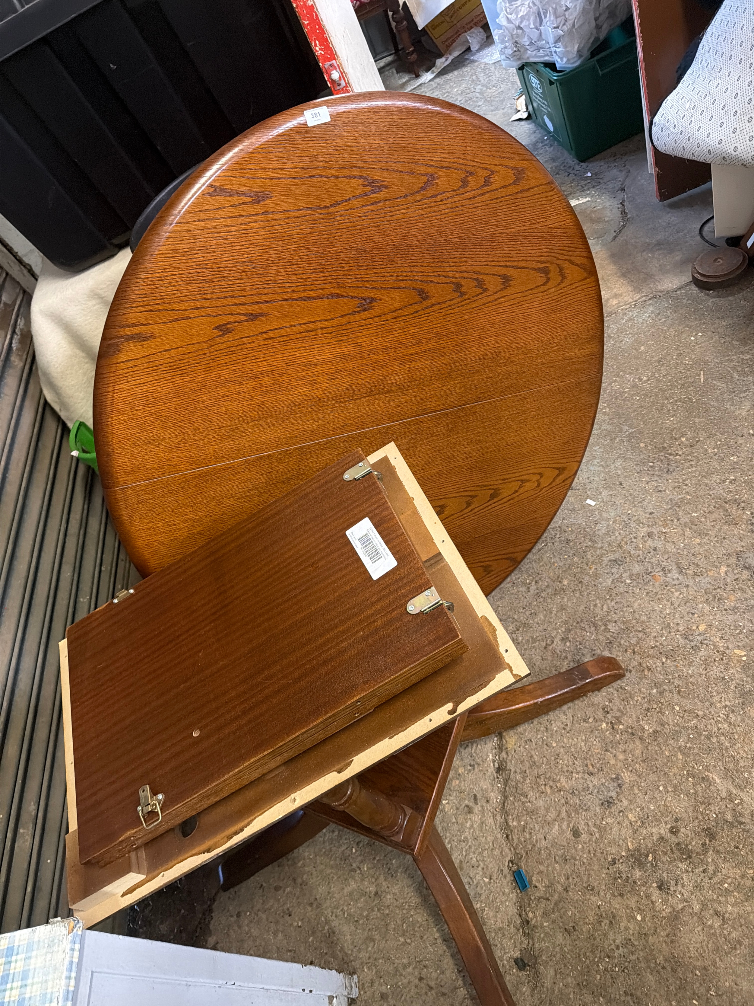 Round oak extending dining table
